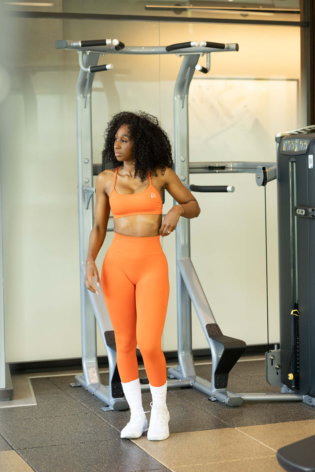 orange strappy activewear bra and leggings set