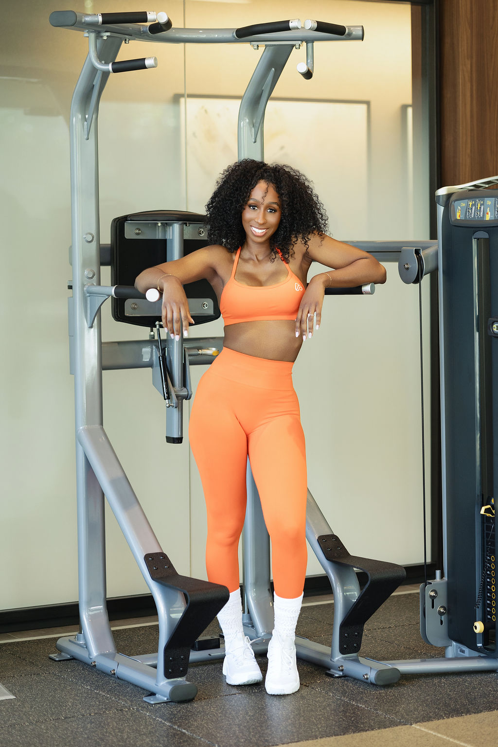 orange strappy activewear bra and leggings set