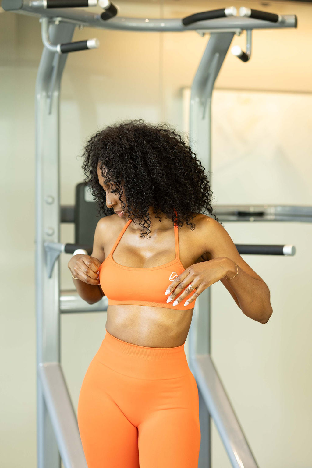 orange strappy activewear bra and leggings set